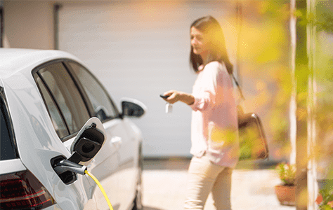 related-content-woman-ev-charge-driveway-min related-content-woman-ev-charge-driveway-min